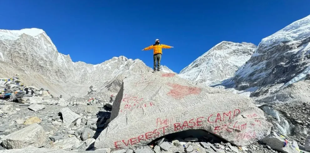 Guest standing on Everest base camp trek